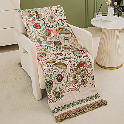 Vändbar boho-filt med blommönster