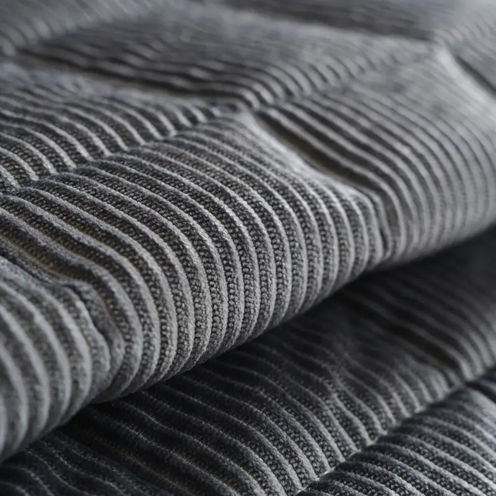 Modernt quiltat sofföverdrag